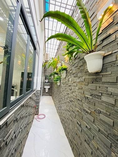 Bán biệt thự 4 tầng đường nhựa 7m xe hơi quay đầu ngủ trong nhà.