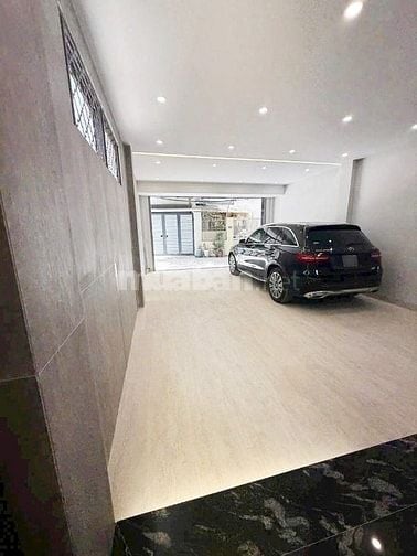 BÁN NHÀ MẶT PHỐ TƯ ĐÌNH- LONG BIÊN - 7 TẦNG THANG MÁY-GARA 2 OTO