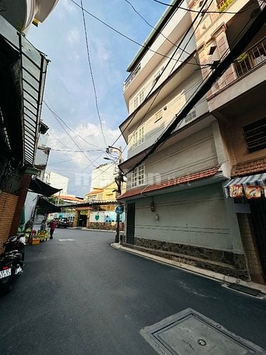 Nhà hai mặt tiền nhựa 8m trước sau Nguyễn Văn Trỗi 5 lầu 8x14m 22 tỷ