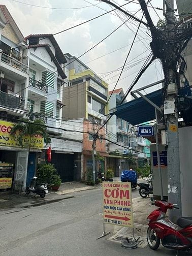 Bán gấp giá 36.5 tỷ. Tòa nhà 14 Nguyễn Văn Vĩnh, Khu sân bay, trệt 5L