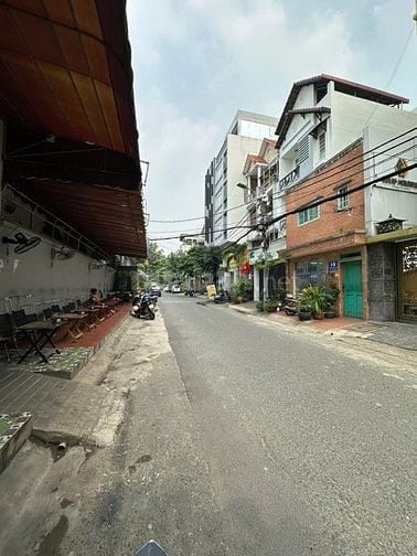 Bán gấp giá 36.5 tỷ. Tòa nhà 14 Nguyễn Văn Vĩnh, Khu sân bay, trệt 5L