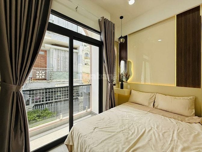 Nhà tuyệt đẹp CAO CẤP hẻm xe hơi sau lưng Mặt tiền Thống Nhất, P16, Q.