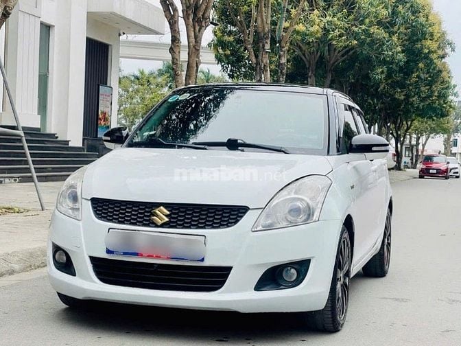 Bán Suzuki Swift Trắng SX 2015 1.4AT Bản Spenciel Logo Vàng