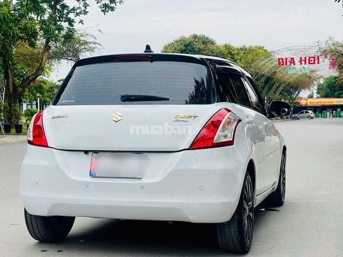 Bán Suzuki Swift Trắng SX 2015 1.4AT Bản Spenciel Logo Vàng