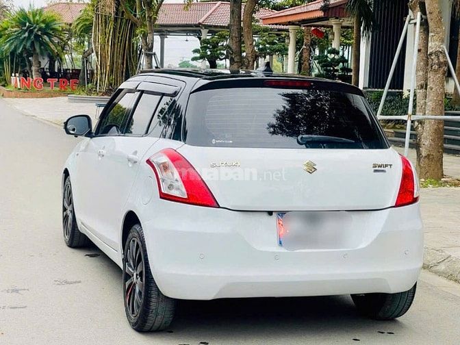 Bán Suzuki Swift Trắng SX 2015 1.4AT Bản Spenciel Logo Vàng
