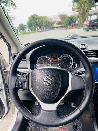 Bán Suzuki Swift Trắng SX 2015 1.4AT Bản Spenciel Logo Vàng
