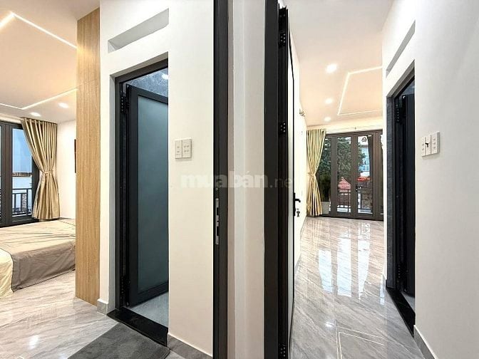 Nhà 2 Lầu tuyệt đẹp CAO CẤP góc 2 Mặt tiền kinh doanh đường Quang Trun
