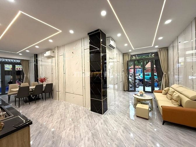 Nhà 2 Lầu tuyệt đẹp CAO CẤP góc 2 Mặt tiền kinh doanh đường Quang Trun