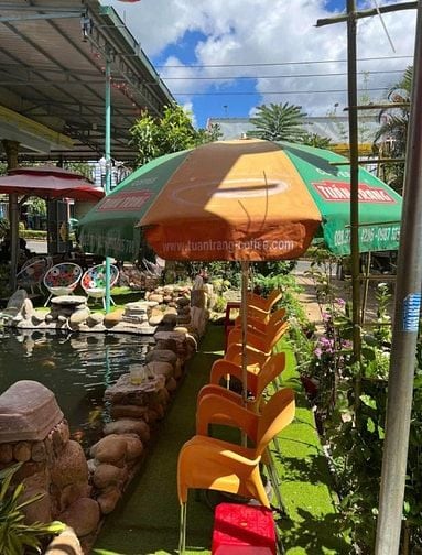 Bán nhà ở gồm cả nhà nghỉ có hồ cá Koi tại Đường Nguyễn Tất Thành, Thị
