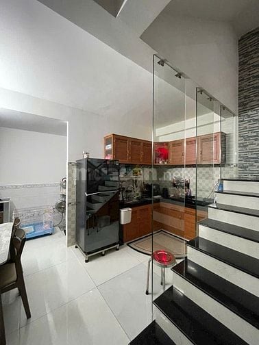 bán nhà lầu + 4 phòng trọ mặt tiền nhựa trung mỹ tây q12