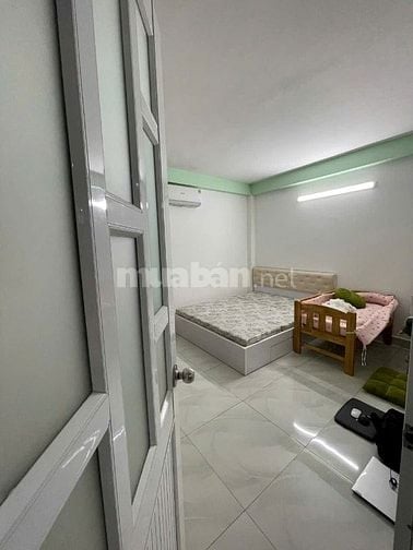 bán nhà lầu + 4 phòng trọ mặt tiền nhựa trung mỹ tây q12