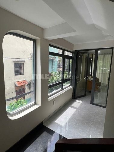 Nhà 6 tầng thang máy góc 2MT Ni Sư Huỳnh Liên Tân Bình giá 14.8 tỷ
