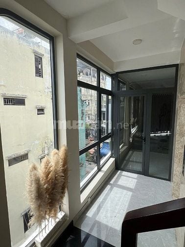 Nhà 6 tầng thang máy góc 2MT Ni Sư Huỳnh Liên Tân Bình giá 14.8 tỷ