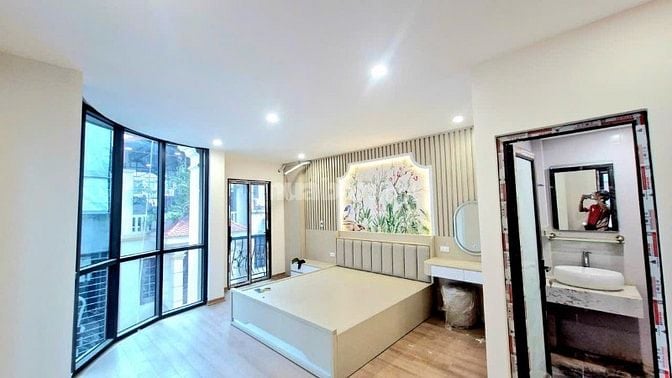 Bán nhà 7T thang máy, lô góc,DT 36m2  mặt ngõ kinh doanh