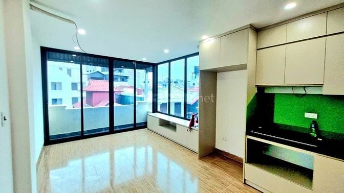 Bán nhà 7T thang máy, lô góc,DT 36m2  mặt ngõ kinh doanh