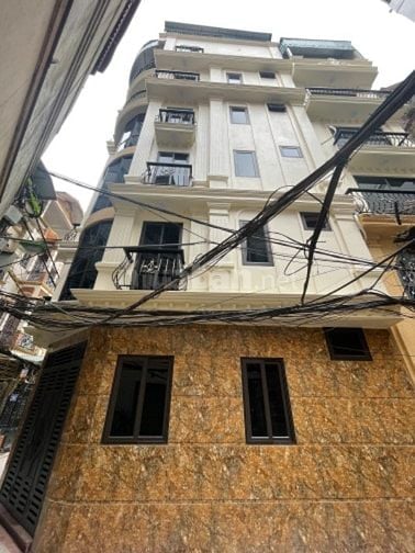 Bán nhà 7T thang máy, lô góc,DT 36m2  mặt ngõ kinh doanh