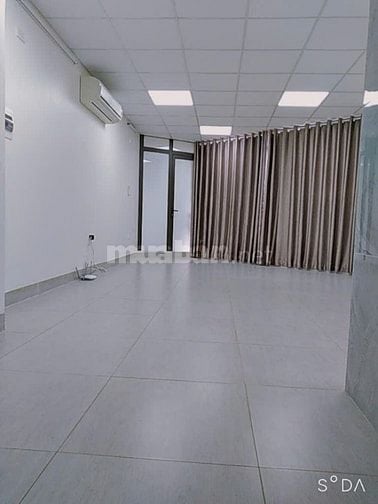 Nhà mặt phố Phạm Văn Đồng thang máy kinh doanh 50m2x6t, giá 25 tỷ