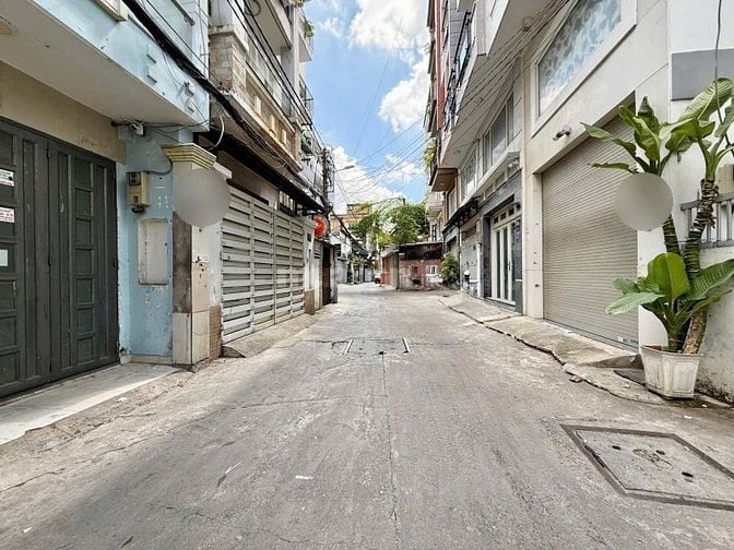 Hẻm xe hơi Phan Đăng Lưu 4Tầng,7PN,Nở Hậu 5,5m,Thông ra Ng Thượng Hiền