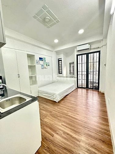 Hẻm xe hơi Phan Đăng Lưu 4Tầng,7PN,Nở Hậu 5,5m,Thông ra Ng Thượng Hiền