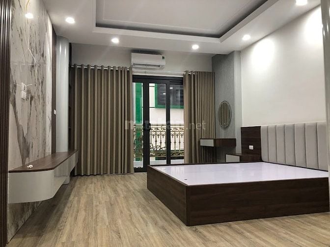 Nhà riêng 51m x 7T thang máy, oto vào nhà, sát Hồ Đền Lừ, giá 20.9 tỷ