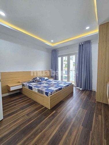 Nhà Thạnh Xuân (4x16)3 lầu 4PN, đường xe oto 8m