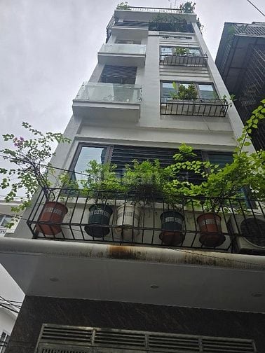 6 Tầng thang máy DT 45m2 nguyễn văn huyên 13,5 Tỷ