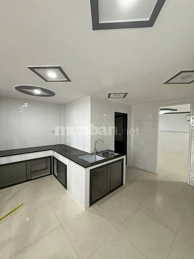 Bán căn nhà 1 trệt, 1 lửng, 1 lầu tại dt 111ṁ2 ngay tại tân hiệp 31, h
