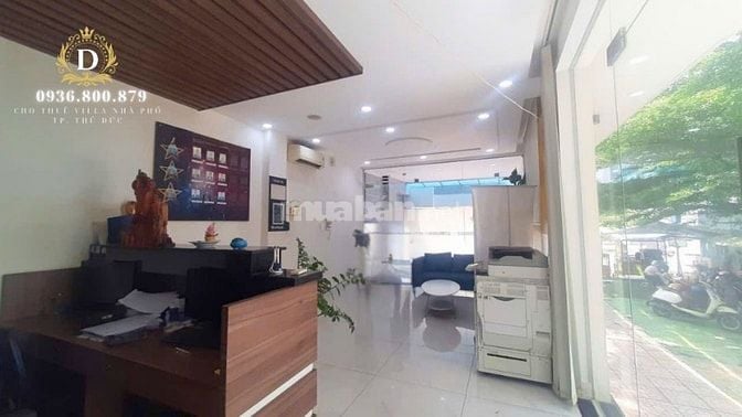 Cho thuê tòa nhà góc 2 mặt tiền,hầm 4 sàn trống, thang máy,có bãi xe 