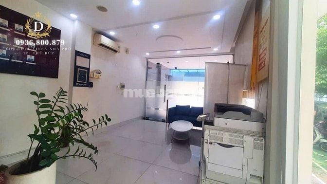 Cho thuê tòa nhà góc 2 mặt tiền,hầm 4 sàn trống, thang máy,có bãi xe 