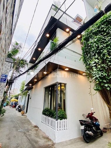 Nhà 3 lầu đẹp Cao Cấp góc 2 mặt hẻm xe hơi 1 trục Lê Đức Thọ, P16, Q.G