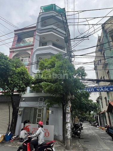 Bán nhà Góc 2 mặt tiền Ni Sư Huỳnh Liên,: 4x14m. 7 tầng thang máy