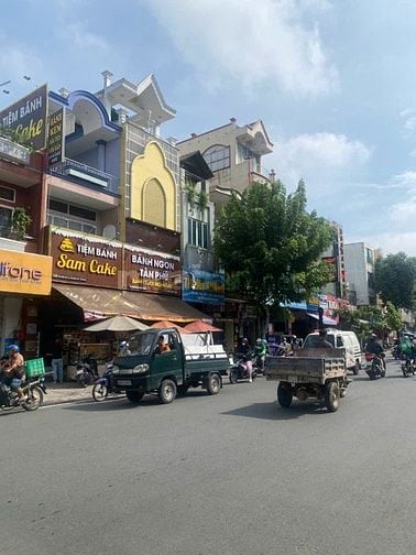 GÓC 2MTKD sầm uất TÂN QUÝ. DT:5.8x18 nở hậu 14m=155m2. Giá: 25 tỷ