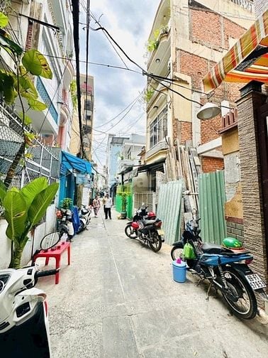 Nguyễn Trãi-Huỳnh M Đạt,4 Tầng,4PN,Nhà mới,An ninh khu ăn uống,Giáp Q1