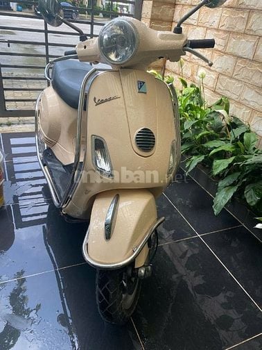 Bán Piaggio Vespa Lx chính chủ màu vàng kem