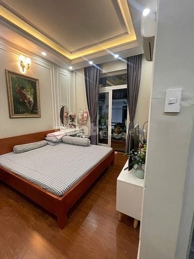 nhà đường số tân quy,4 tầng,nhà như hình giá 9ty9.Lh atrung 0931432374