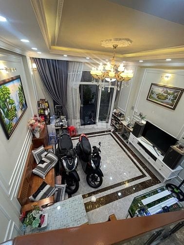 nhà đường số tân quy,4 tầng,nhà như hình giá 9ty9.Lh atrung 0931432374