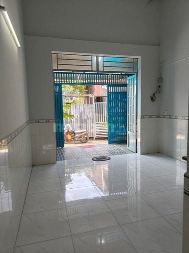Bán nhà 2/ ngắn DT:4mX12m 1T + lửng 2pn,2w phòng khách bếp