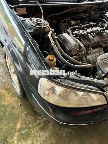 Ford Laser GHIA 1.8AT 2004 Màu Đen
