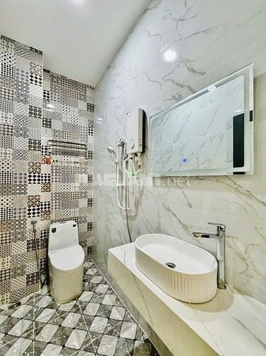 Bán nhà Bình Thạnh 67,2m2 giá 2 tỷ 590 triệu đường Nơ Trang Long, P13.