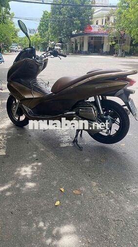 PCX 125 máy êm thì thầm, áo còn dán keo