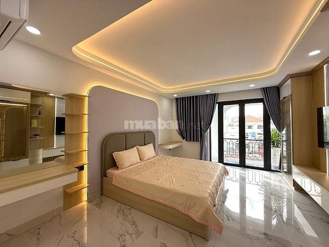 Siêu phẩm 5 Lầu THANG MÁY CAO CẤP Gara để 2 xe hơi hẻm 10m Lê Đức Thọ