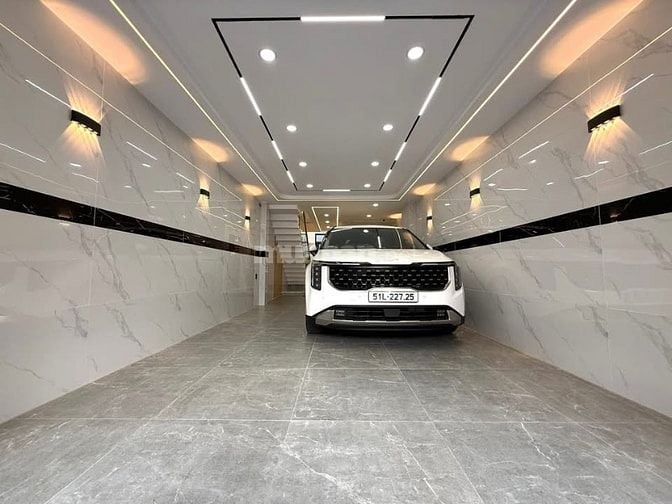Siêu phẩm 5 Lầu THANG MÁY CAO CẤP Gara để 2 xe hơi hẻm 10m Lê Đức Thọ
