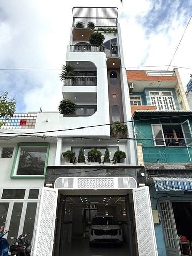 Siêu phẩm 5 Lầu THANG MÁY CAO CẤP Gara để 2 xe hơi hẻm 10m Lê Đức Thọ