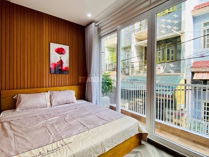 Nhà 4,7 x 9 đúc 1 trệt 1 lững 2 lầu sân thượng hẻm xe hơi thống nhấP16