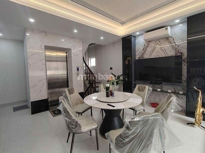 NHÀ MỚI PHỐ BỒ ĐỀ - LÔ GÓC - 7TẦNG THANG MÁY - OTO NHỎ VÀO NHÀ 