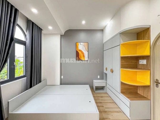 Nhà 2 lầu  ngay chợ đêm bà tri Tân Uyên TPHCM (BD cũ)