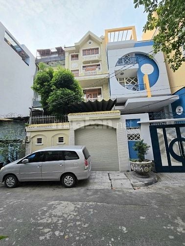 Cần bán nhà HXH 8m Tô Hiến Thành, P.12, Q.10. DT: 6x25m, hầm + 4 lầu