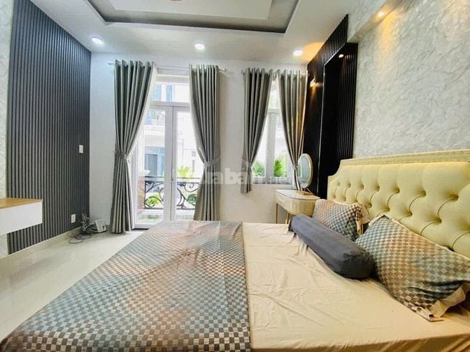 Nhà 3 lầu 4x12,5m Hẻm xe hơi cách Quang Trung 200m ,7Tỷ150