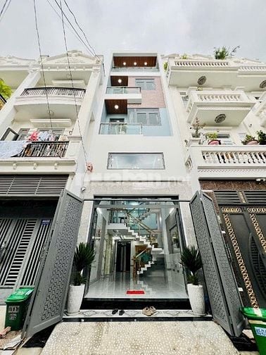 NHÀ MỚI XÂY mặt tiền đường nhựa 6m Rất đẹp. Xem là thích ngay
