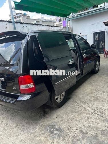 Kia Carnival 2009 GS 2.5 AT - 100000 km